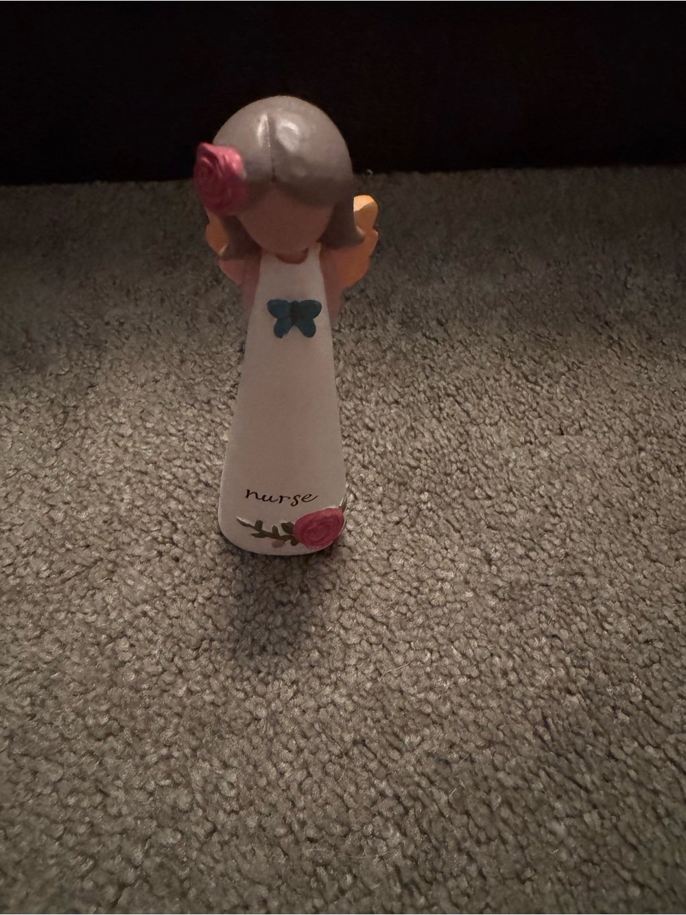 White Nurse Figurine with Pink Rose Accent